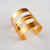 Wide striped gilt bracelet