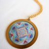 The sky mandala necklace is shining