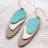 Soft cosmic wave earrings