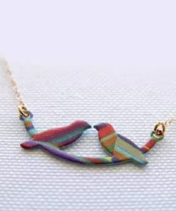 A string of birds on a small colored swing