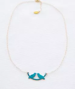 A string of birds on a small turquoise swing