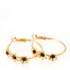 Floral hoop earrings in black gold