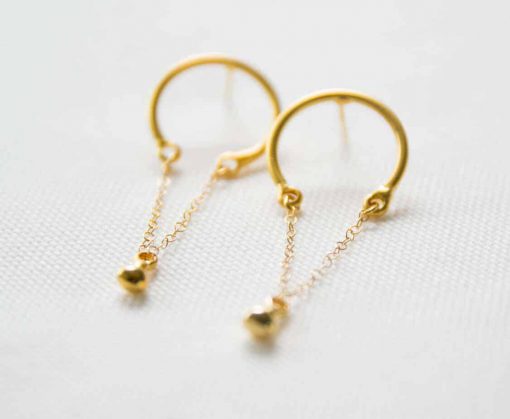 Gold earrings with gilt earrings
