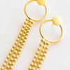 Gold curling earrings