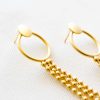 Gold curling earrings