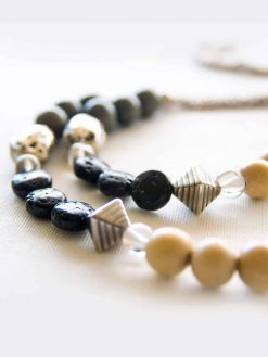 A long Bohemian brass necklace with silver plated, wooden beads, gemstones, basalt stones